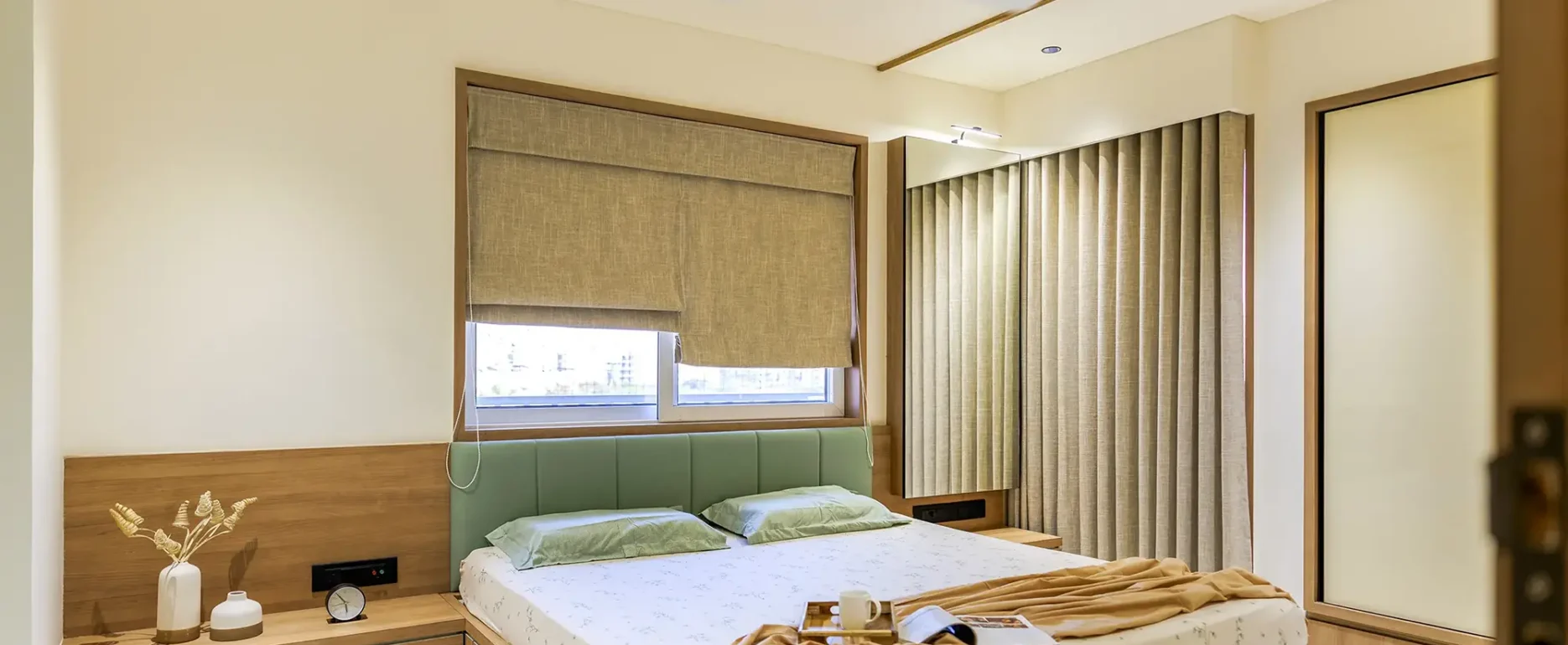 HOW TO CHOOSE AN INTERIOR DESIGNER IN RAJKOT 4 Modern Interior Design Rajkot – VRAJ Bedroom with Sage Green Headboard