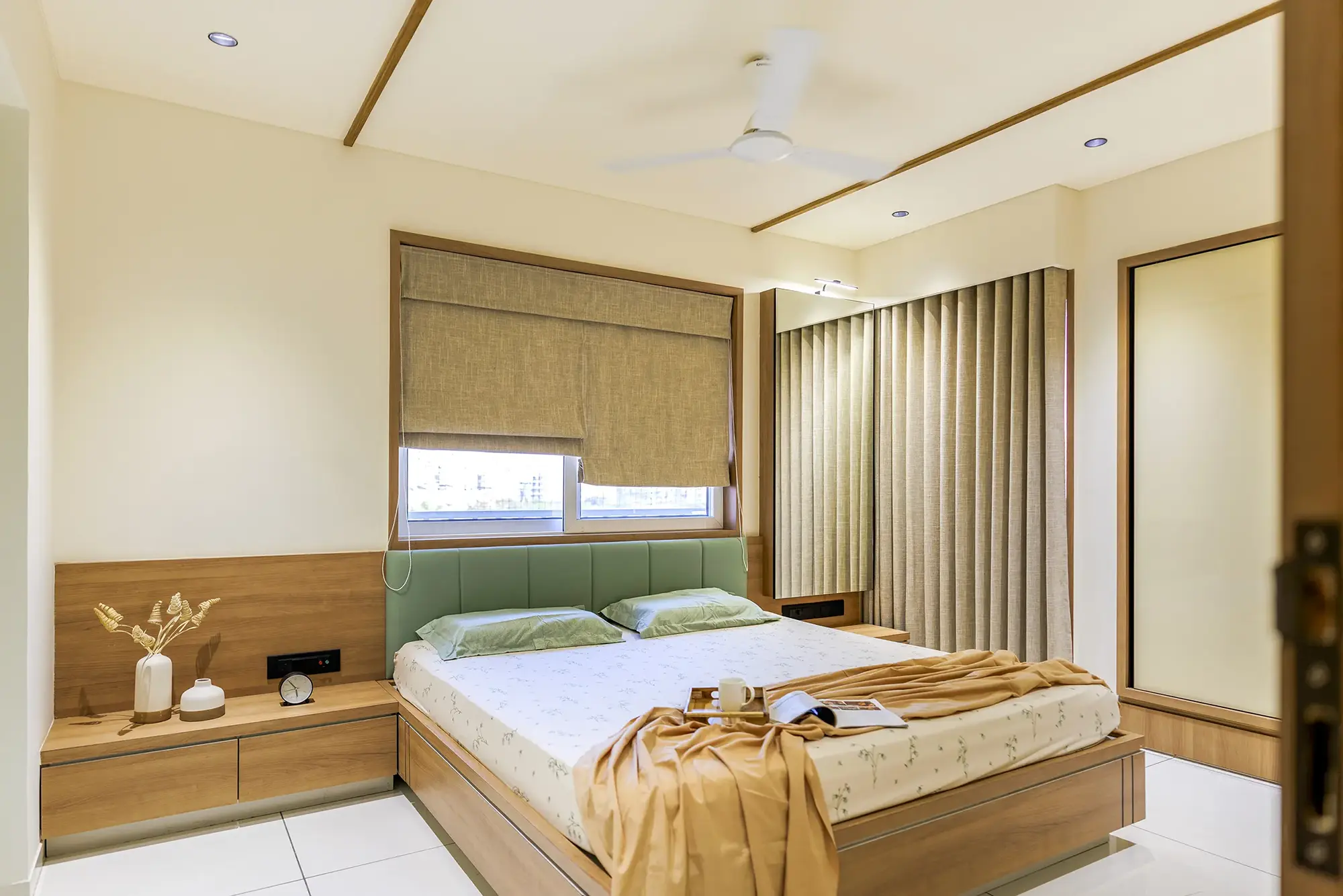 VRAJ – MODERN RESIDENCE 16 Modern Interior Design Rajkot – VRAJ Bedroom with Sage Green Headboard